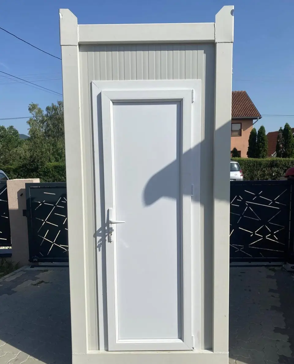 White flushing restroom unit