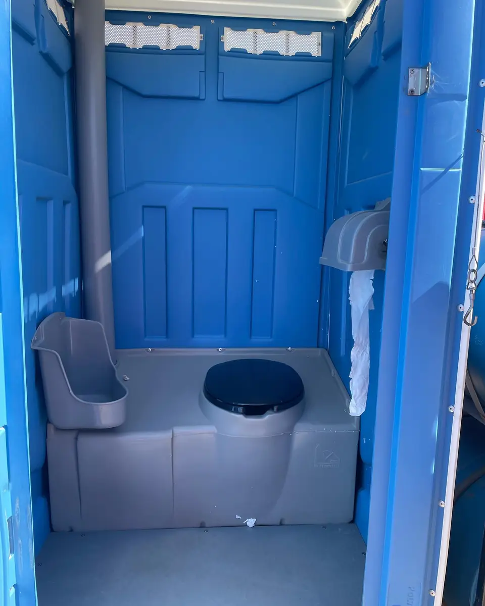 Roomy wheelchair-accessible porta potty interior