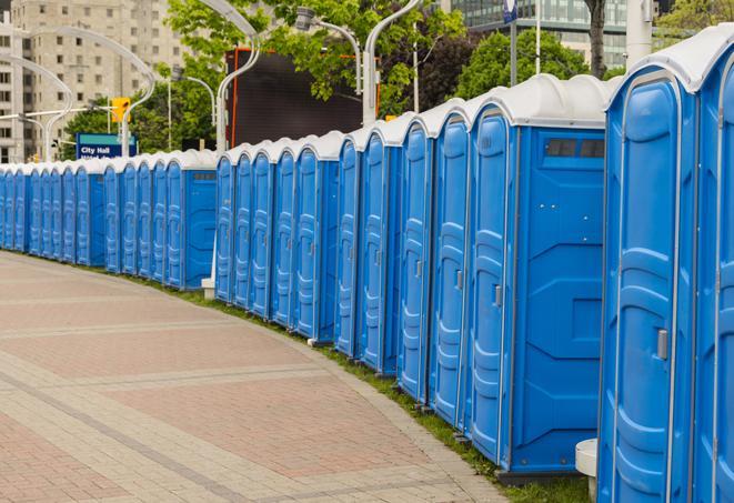 a row of portable restrooms at a fairground, offering visitors a clean and hassle-free experience in stillwater